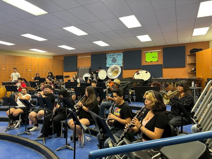 Member of the Marching band playing there instruments.